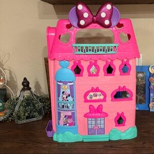 Charming Pink and Blue Dollhouse by [Brand]